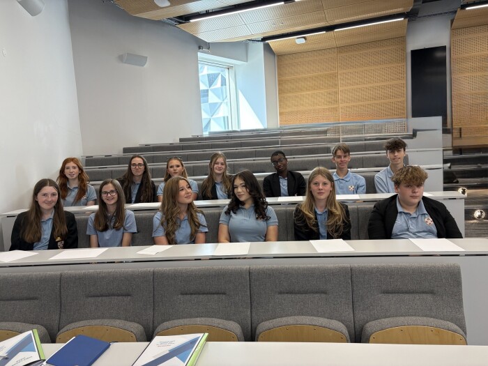 Students sitting in a lecture theatre 